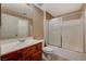 A bathroom with a shower over bath and single sink vanity at 5855 Valley Dr # 2045, North Las Vegas, NV 89031
