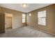 Empty bedroom with neutral colors, carpet, and walk-in closet at 5855 Valley Dr # 2045, North Las Vegas, NV 89031