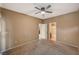 Carpeted bedroom featuring an ensuite bathroom and access to the kitchen at 5855 Valley Dr # 2045, North Las Vegas, NV 89031