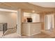The living area with a breakfast bar and a staircase at 5855 Valley Dr # 2045, North Las Vegas, NV 89031