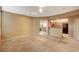 Open concept living room with combined seating and kitchen area at 5855 Valley Dr # 2045, North Las Vegas, NV 89031