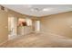 Open-concept living area with neutral tones, seamlessly connecting the kitchen and living spaces at 5855 Valley Dr # 2045, North Las Vegas, NV 89031