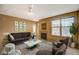 Living room featuring stylish furniture, decor, a fireplace, and ample natural light at 5855 Valley Dr # 2045, North Las Vegas, NV 89031