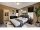 Comfortable primary bedroom featuring ample natural light and neutral tones at 5855 Valley Dr # 2045, North Las Vegas, NV 89031