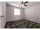 Cozy bedroom with neutral walls and carpet flooring at 6642 Evander St, North Las Vegas, NV 89086