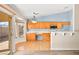 Kitchen with light wood cabinets, tile floors and stainless steel appliances at 7513 Powder River Ct, Las Vegas, NV 89131