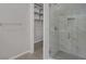 Bathroom with walk-in shower and closet access at 840 Stepney Pl, Henderson, NV 89011