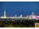 Night time aerial view showcasing the city lights at 9101 Alta Dr # 502, Las Vegas, NV 89145