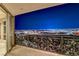 Private balcony with ornate railing and city views at night at 9101 Alta Dr # 502, Las Vegas, NV 89145