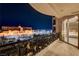 Private balcony offering stunning nighttime city views at 9101 Alta Dr # 502, Las Vegas, NV 89145