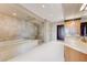 Luxurious bathroom with soaking tub, walk-in shower, and double vanity at 9101 Alta Dr # 502, Las Vegas, NV 89145