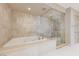 Spa-like bathroom with a soaking tub and walk-in shower at 9101 Alta Dr # 502, Las Vegas, NV 89145
