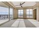 Spacious bedroom with large windows offering scenic views and a private balcony at 9101 Alta Dr # 502, Las Vegas, NV 89145