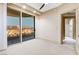 Bright bedroom with access to a private balcony and city views at 9101 Alta Dr # 502, Las Vegas, NV 89145