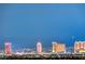 Night time image showcasing a cityscape with illuminated buildings at 9101 Alta Dr # 502, Las Vegas, NV 89145