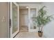 Elegant entryway with glass doors and tiled floors at 9101 Alta Dr # 502, Las Vegas, NV 89145