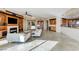 Bright living room with hardwood floors and built-in shelving at 9101 Alta Dr # 502, Las Vegas, NV 89145