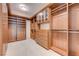 Large walk-in closet with custom built-ins and ample shelving at 9101 Alta Dr # 502, Las Vegas, NV 89145