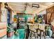 Rustic outdoor bar with wooden stools and unique decor at 919 Havre Ave, Henderson, NV 89015
