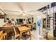 Finished basement with sectional sofa, spiral staircase, and game area at 919 Havre Ave, Henderson, NV 89015