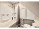 Clean bathroom featuring shower-tub combination, toilet, and functional cabinets at 919 Havre Ave, Henderson, NV 89015
