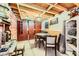 Basement dining area with rustic table and chairs at 919 Havre Ave, Henderson, NV 89015