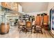 Unique dining area with open layout, spiral staircase, and decorative accents create a distinctive and inviting space at 919 Havre Ave, Henderson, NV 89015