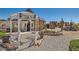 Charming landscaped front yard featuring a gazebo and decorative elements at 919 Havre Ave, Henderson, NV 89015