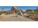 Spacious front yard showcasing desert landscaping and charming details at 919 Havre Ave, Henderson, NV 89015