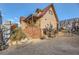 Themed house exterior with brick accents and a charming walkway at 919 Havre Ave, Henderson, NV 89015