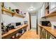 Compact kitchenette with countertop appliances and ample storage at 919 Havre Ave, Henderson, NV 89015