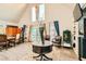 Bright and airy living room with high ceilings, decorative fireplace, and comfortable seating, ideal for relaxation at 919 Havre Ave, Henderson, NV 89015