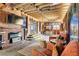 Cozy living room with a brick fireplace and unique decor at 919 Havre Ave, Henderson, NV 89015