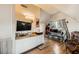 Upstairs loft area with daybed, TV, and built-in cabinets at 919 Havre Ave, Henderson, NV 89015