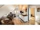 Spacious loft with home office, sitting area, and wood flooring at 919 Havre Ave, Henderson, NV 89015