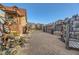 Unique yard with themed decor and stone pathway at 919 Havre Ave, Henderson, NV 89015