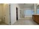 Spacious bathroom with shower, tub, and double sinks at 9763 Waukegan Ave, Las Vegas, NV 89148