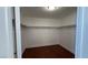 Large walk-in closet with wood flooring and shelving at 9763 Waukegan Ave, Las Vegas, NV 89148