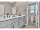 Double vanity bathroom with modern finishes and a toilet at 10301 Fairview Ridge Ct, Las Vegas, NV 89166