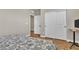 Bright bedroom with floral bedding and ample closet space at 10301 Fairview Ridge Ct, Las Vegas, NV 89166