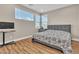 Spacious bedroom with a king-size bed and large windows at 10301 Fairview Ridge Ct, Las Vegas, NV 89166