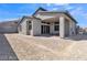 House exterior showcasing backyard and covered patio at 10301 Fairview Ridge Ct, Las Vegas, NV 89166