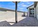Private brick patio with seating area and block wall at 10301 Fairview Ridge Ct, Las Vegas, NV 89166
