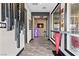 Hallway with decorative accents, large windows, and a view to the backyard at 10729 Beecher Park Ave, Las Vegas, NV 89166