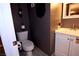 Clean bathroom with white vanity and toilet at 1303 Darlene Way # 102B, Boulder City, NV 89005