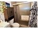 Bathroom with shower, toilet and cabinet at 1303 Darlene Way # 102B, Boulder City, NV 89005