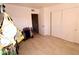 Bright bedroom with double door closet and tile floors at 1303 Darlene Way # 102B, Boulder City, NV 89005