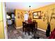 Charming dining area with a square table, four chairs, and a chandelier at 1303 Darlene Way # 102B, Boulder City, NV 89005