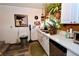 White kitchen cabinets, stainless steel appliances at 1303 Darlene Way # 102B, Boulder City, NV 89005