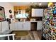 Well-equipped kitchen with white cabinets and stainless steel appliances at 1303 Darlene Way # 102B, Boulder City, NV 89005